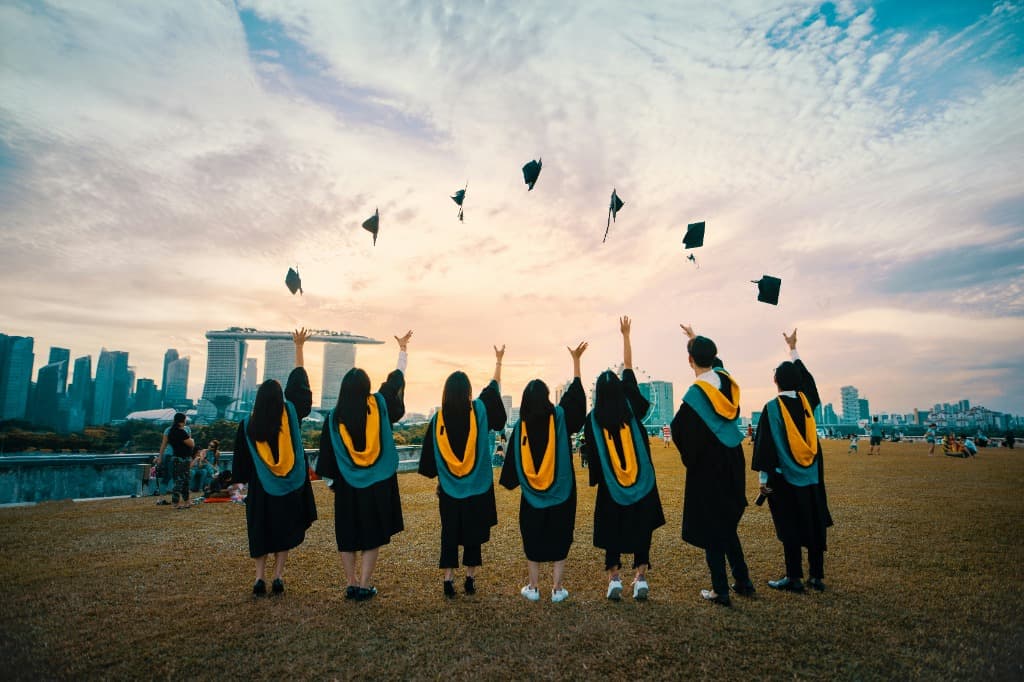 Graduates celebrating success abroad